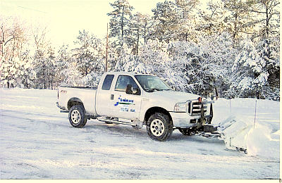 Snow plowing at a local HOA condo development, Pleasant Gardens, in Jackson NJ